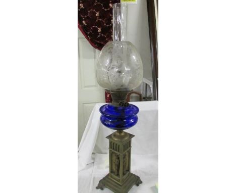 A fabulous Victorian brass oil lamp with figures in base, Bristol Blue glass font and original acid etched bee-hive shade. **