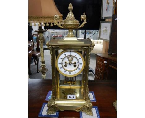 A good brass chiming mantel clock complete with mercury pendulum and in working order. ****Condition report**** Height 50cm.W