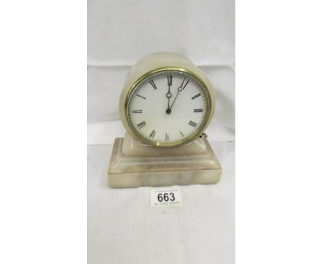 A French alabaster mantel clock, in working order.