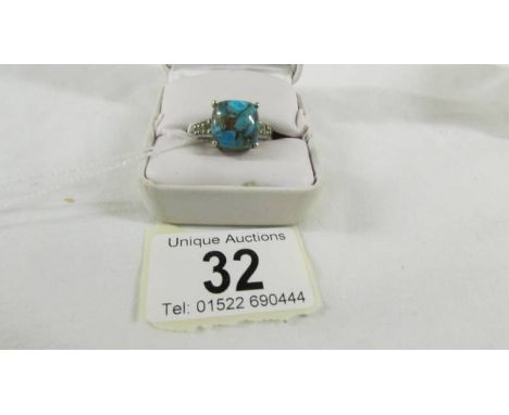 A silver ring set turquoise stone,size U.