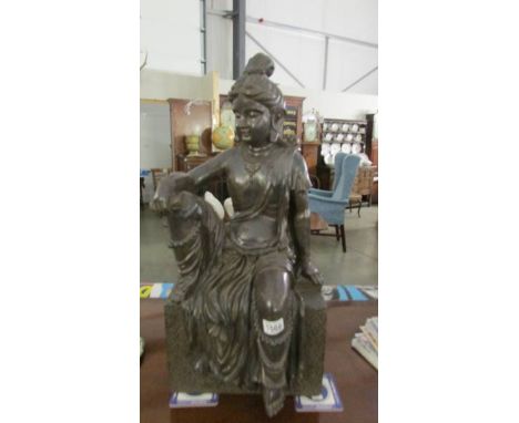 A large statue of Buddha (a good decorators piece).