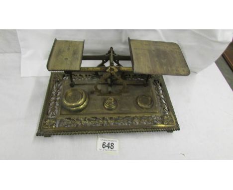 A good set of brass scales with weights.