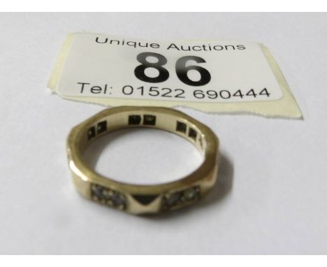 A 9ct gold eternity ring, size K.