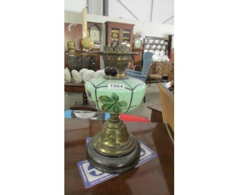 A Victorian oil lamp base with hand painted glass font and Duplex burner.  (No shade or chimney).