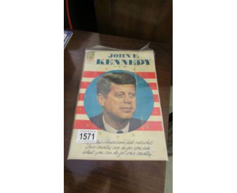 A John F Kennedy first edition comic by Dell, inside is in fairly good condition, cover has wear due to age and there is a sm