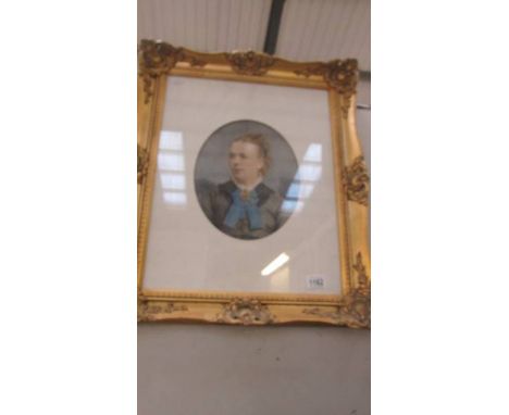 An Edwardian oval watercolour portrait of a lady in a gilt frame, frame approximately 50 x 63 cm.