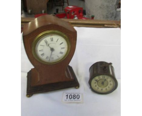 An Edwardian inlaid mahogany Maple &amp; Co., Paris mantel clock and one other.