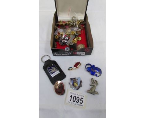 A mixed lot of pin badges etc., including some enamel &amp; silver also military buttons.