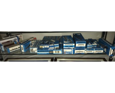 A selection of boxed Marklin HO gauge rolling stock and track including Fleischmann and Bachmann.