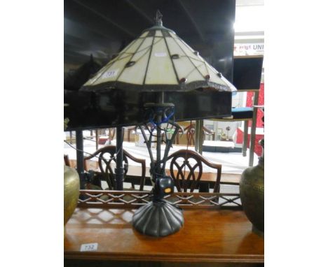 A table lamp with Tiffany style shade.