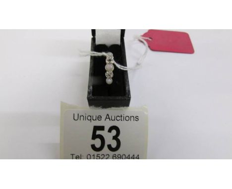 A vintage 5 stone diamond and opal ring in 18ct gold and set in platinum, size L half. ****Condition report**** Good shape.
S