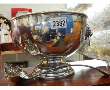 A good silver plate punch bowl with ladle. ****Condition report**** Substantial scratching/spidering to plate inside bowl, al