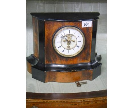An open escapement chiming mantel clock in good working order but missing glass to front.