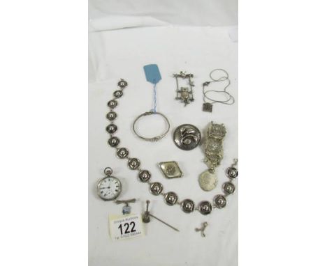 A silver fob watch, a silver bangle and further jewellery items.