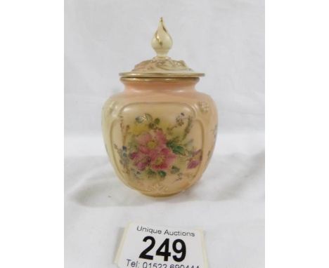 A Royal Worcester Blush Ivory lidded pot.