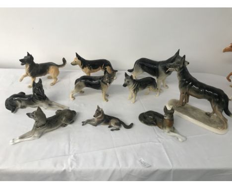 Ten ceramic figures of german shepherds to inc. Royal Dux, Rosenthal etc