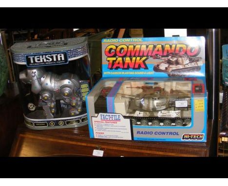 A Teksta Interactive Robotic Puppy, together with a model Commando Tank 