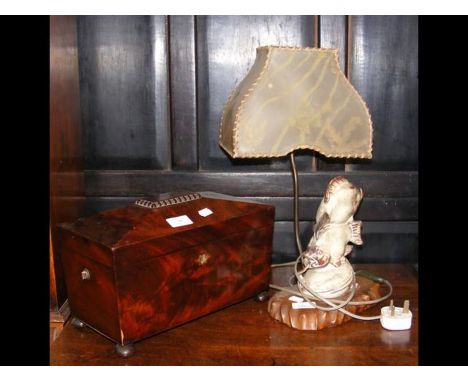 A Victorian tea caddy together with an Oriental table lamp in the form of a fish