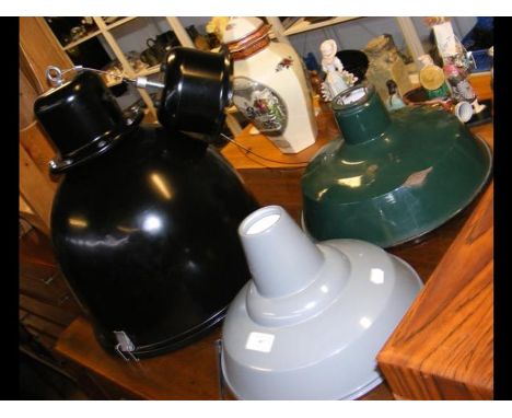 A black industrial style ceiling lamp, together with three lampshades 
