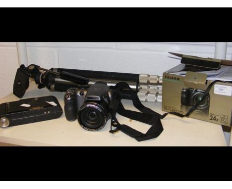 A Fujifilm Finepix S4200 camera - boxed, together with a tripod and one other camera