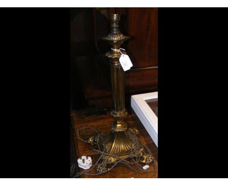 A 55cm high decorative brass table lamp