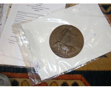 A First World War memorial plaque inscribed Malcolm Edward Ellis, with associated paperwork