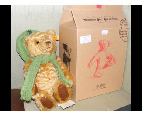 A modern Steiff collectable bear with growler, box and certificate