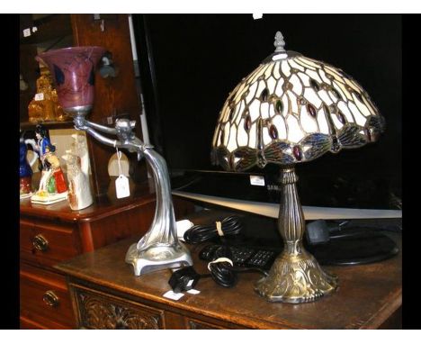 An Art Nouveau style table lamp with pink glass shade together with a Tiffany style table lamp