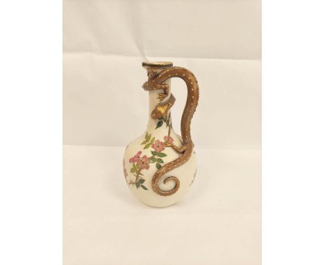Royal Worcester style ivory ground jug with moulded scalloped ground decorated with foliage and creeping salamander handle. G