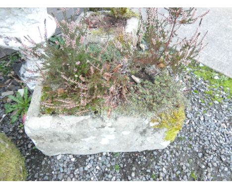 Antique carved sandstone trough. Height 26cm, Width 56cm, Depth 35cm.