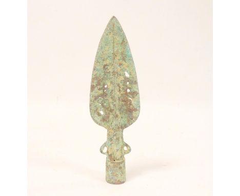 Antique bronze Chinese spearhead, possibly Han Dynasty, having pierced decoration and rich verdigris. Length 23cm.