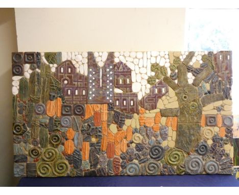 Paul B Hardcastle. Abstract ceramic mosaic wall panel of a stylised town scene having applied spirals and incised decoration.