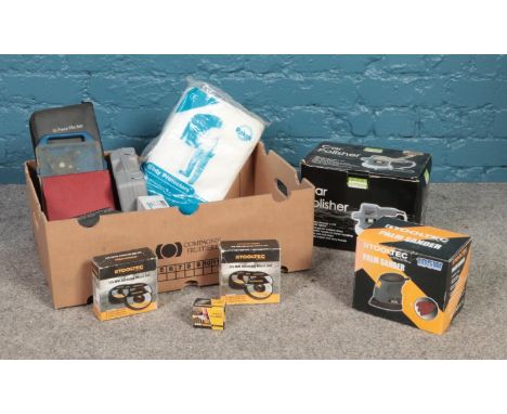 A box of tools. Palm Sander, Mini grinder, pop rivet gun, files, car polisher etc  