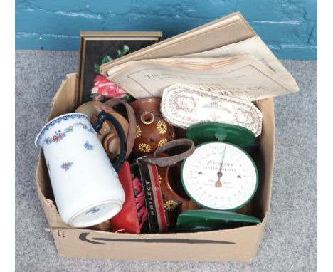 A box of assorted collectables. To include posting scales, salt pigs and boxed rolls razor.  