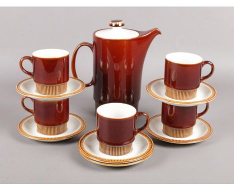 A Poole part coffee set. To include hot water jug, cups and saucers.  