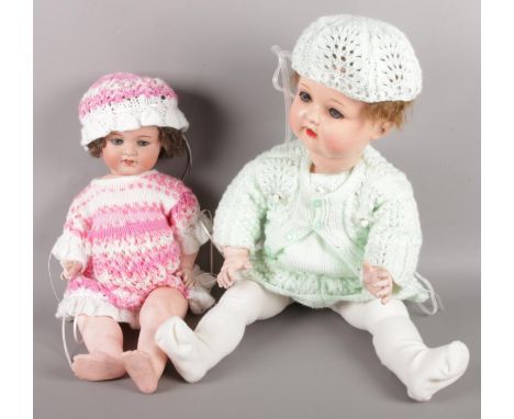 Two Armand Marseille bisque head dolls. Both stamped to the back of the neck.  