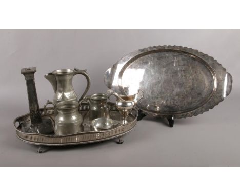 A selection of metalwares. To include three pieces of Pilgrim Pewter, a silver plated tray and a arts and craft style candles