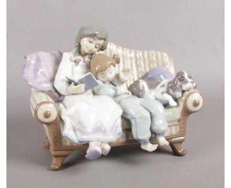 A Lladro 5735 'Big Sister' figurine. 18cm height.  