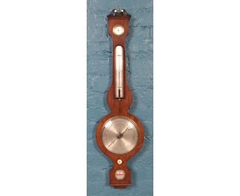 A rosewood banjo barometer with silvered dial.  