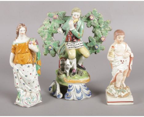 Three 19th Century ceramic figures, one surrounded by bocage.  Damage to all figures.