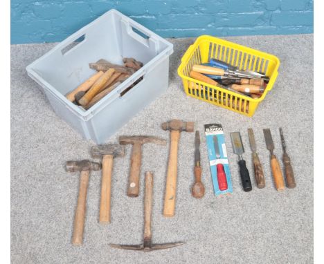 A quantity of assorted tools. To include hammers, pick axes and various sized chisels.  