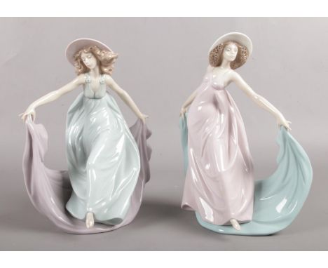 A pair of Lladro figurines. ' May Dance' &amp; 'Spring Dance'  5662 &amp; 5663. Sculptor Jose Puche. Issued 1990 - 2001 Retir