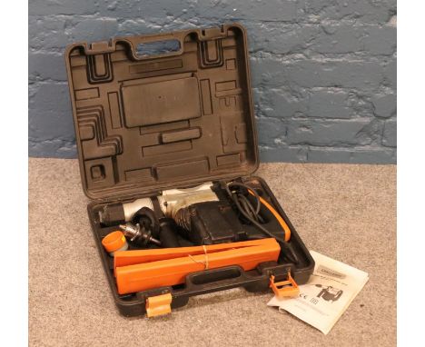 A Challenge 900 Watt Rotary hammer drill with drill bits and chisels  