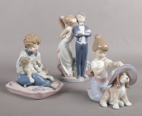 A quantity of Lladro figures. (3) 'Behave' 5703, 'An Elegant touch' 6862, 'Lets Make up' 5555.  