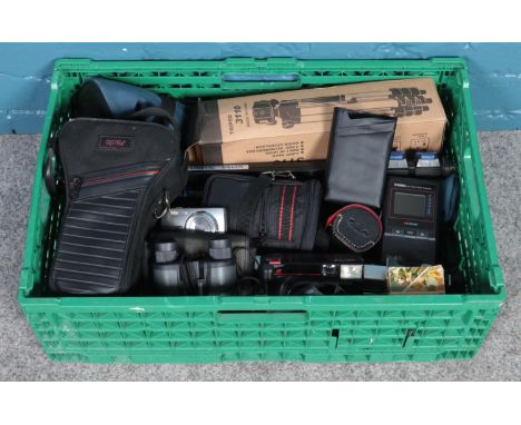 A box of photographic equipment. Includes several cameras, including Olympus 840, tripods and a Casio TV-400 portable LCD TV.