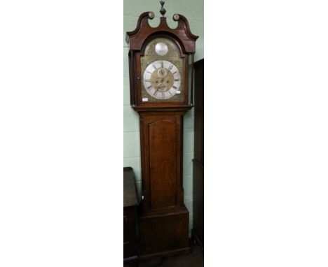 An oak eight day longcase clock, with arched brass dial with silvered plaque bearing a later signature John Paterson, Kilty