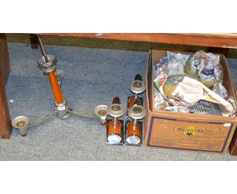 A 1920s chrome and bakelite three light chandelier together with three matching wall lights 