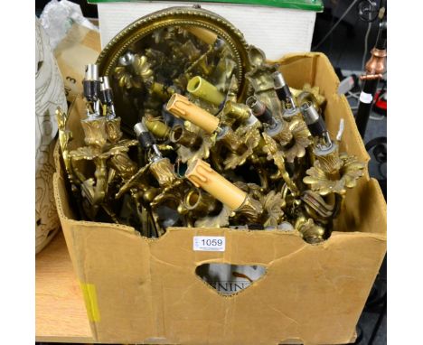 A group of gilt metal twin light wall sconces, etc