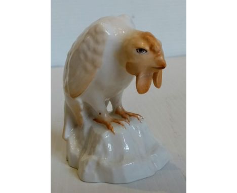 A Royal Worcester netsuke modelled as a black cockerel and heightened in green, green printed mark with date code for 1933, h