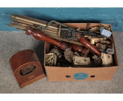 A large box of furniture accessories/restorers parts, containing a mantle clock case, brass rods, lock plates, casters etc.  